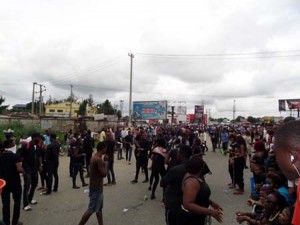 Protesters-blocking-the-East-West-road-....