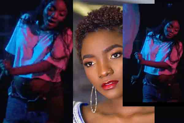 Pregnant Simi shows off babybump in new music video