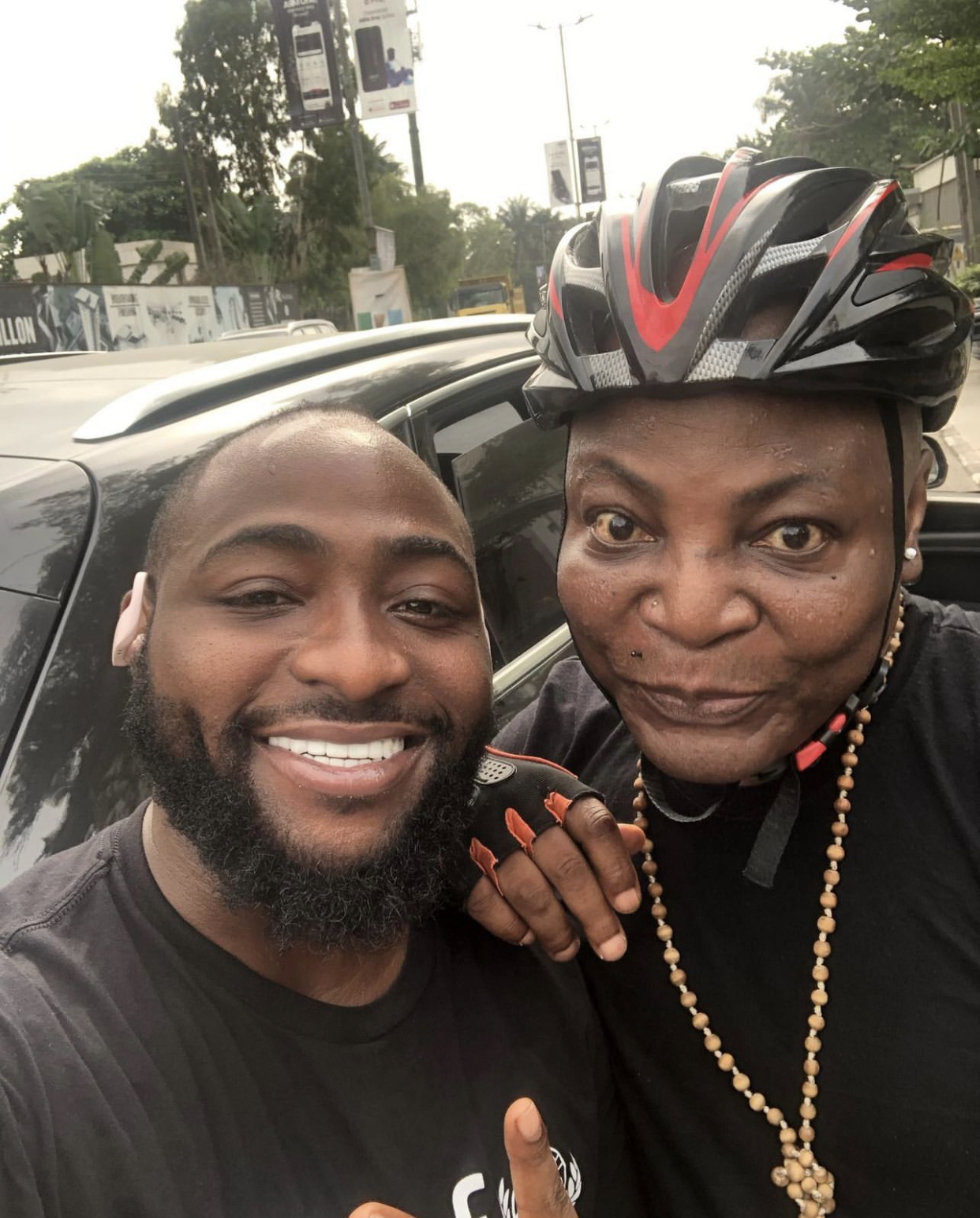 Clearlie Boy And Davido Strike Poses Together Outside Their Polling Unit